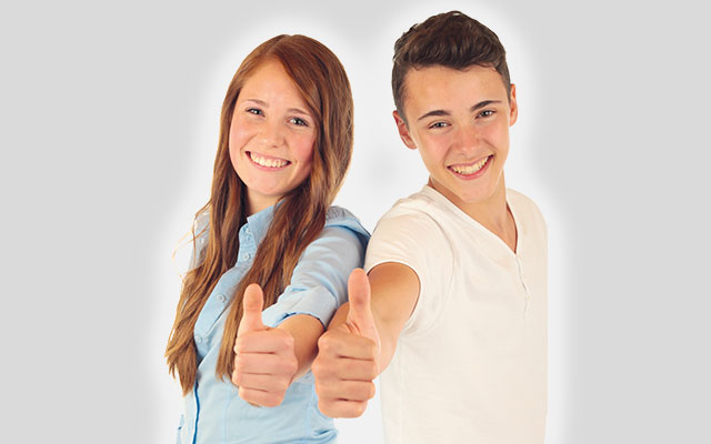 a man and woman giving thumbs up